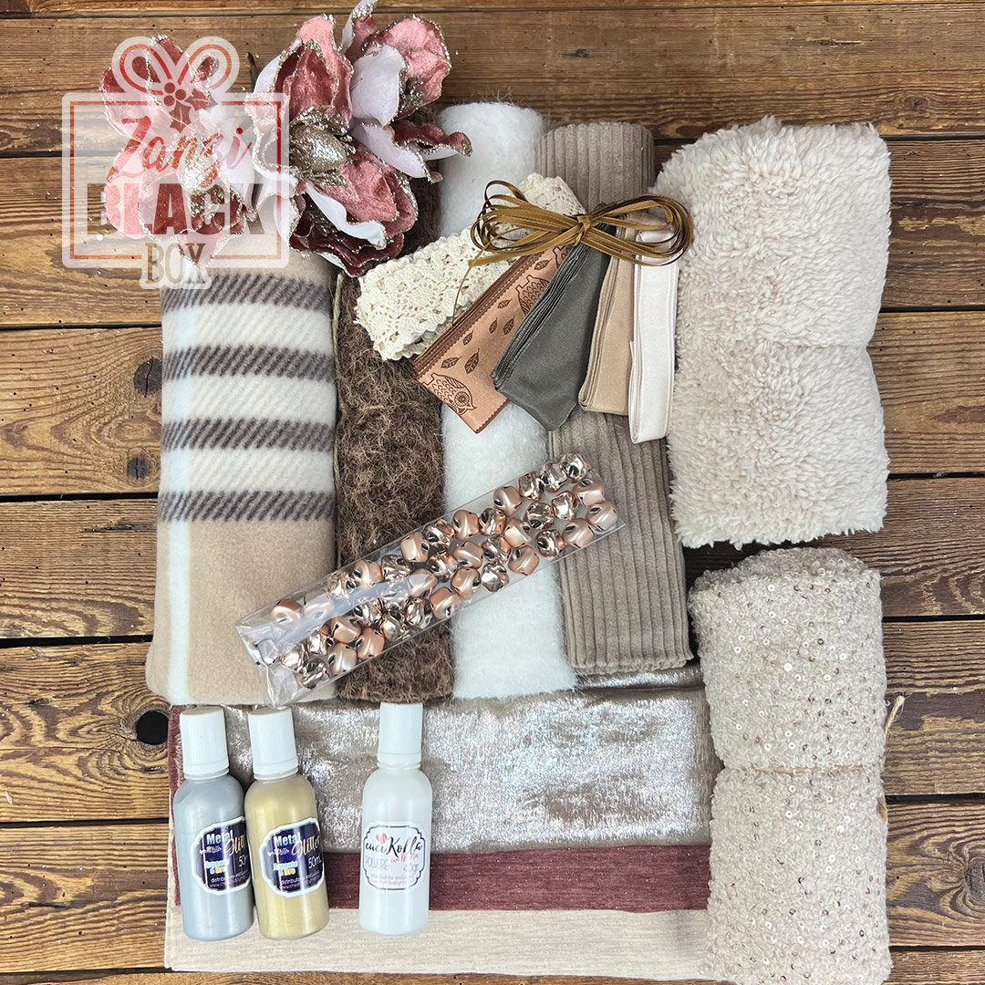 Set creativo con tessuti, nastri e vernici decorative