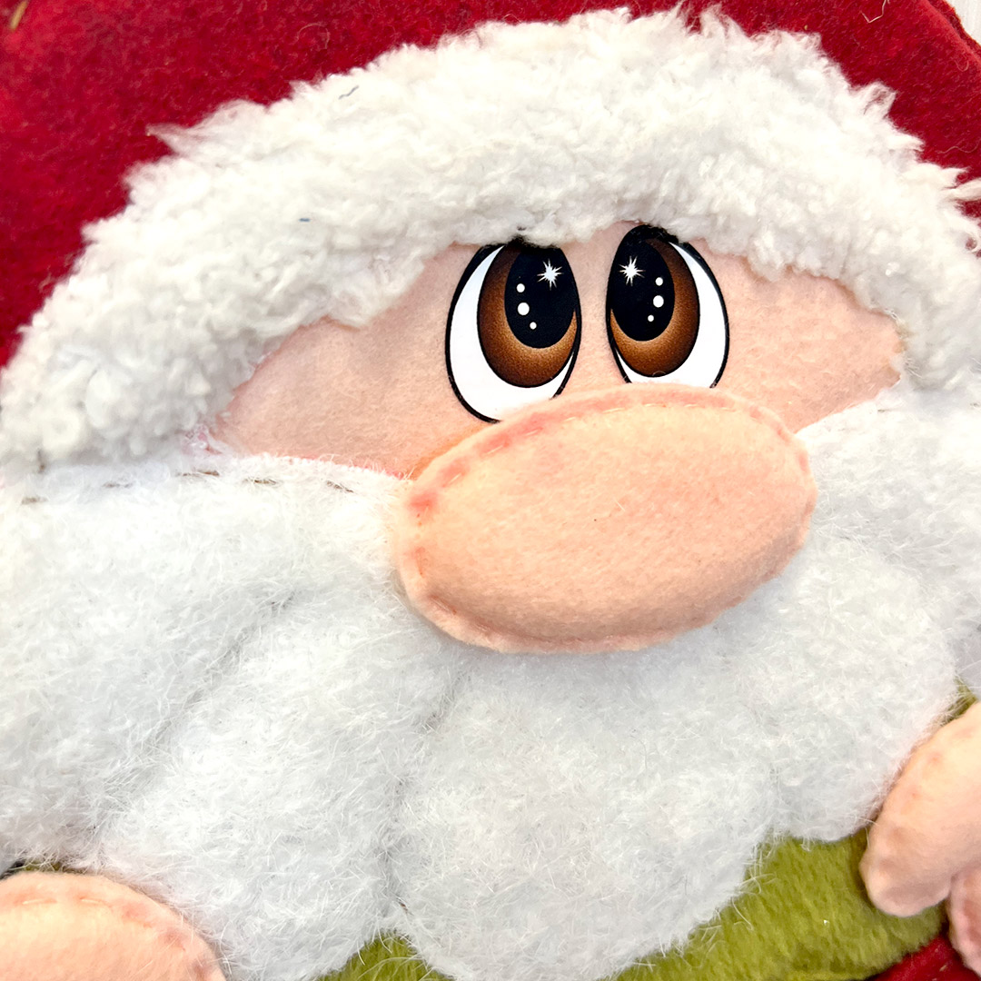 Peluches natalizio con barba bianca e cappello rosso