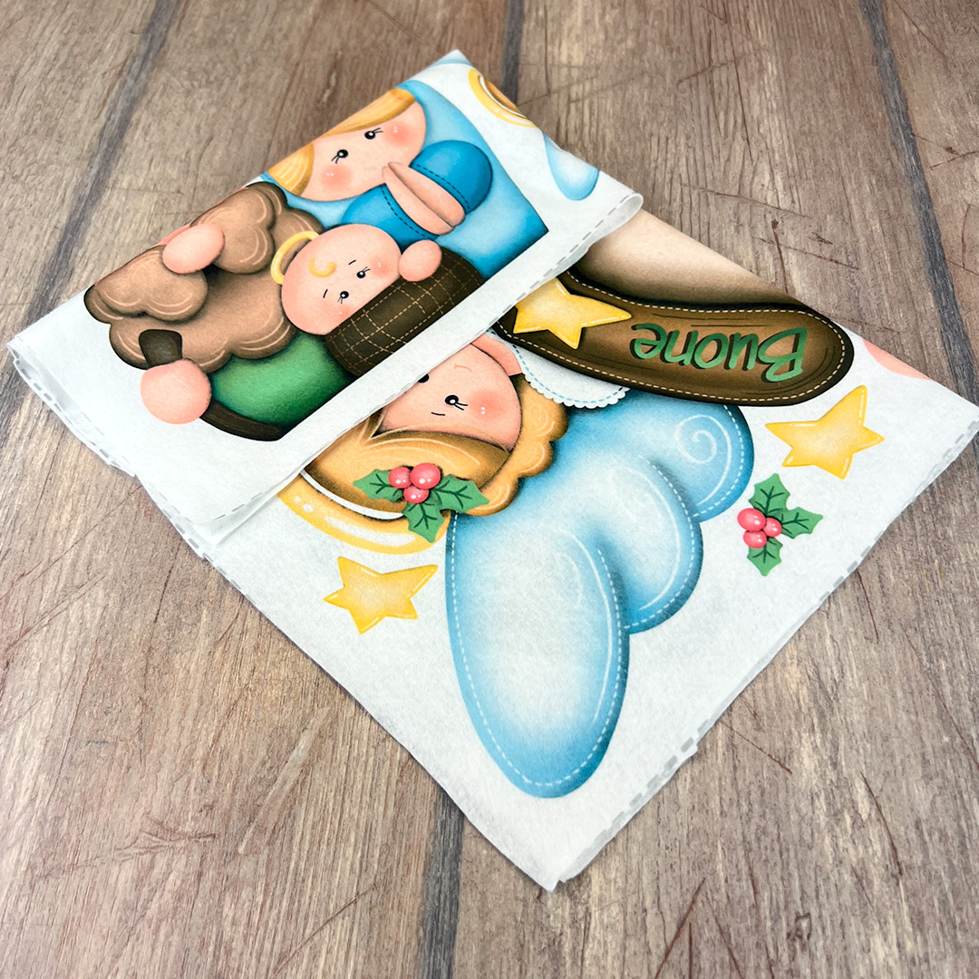 Tovagliolo natalizio con angeli e decorazioni festive