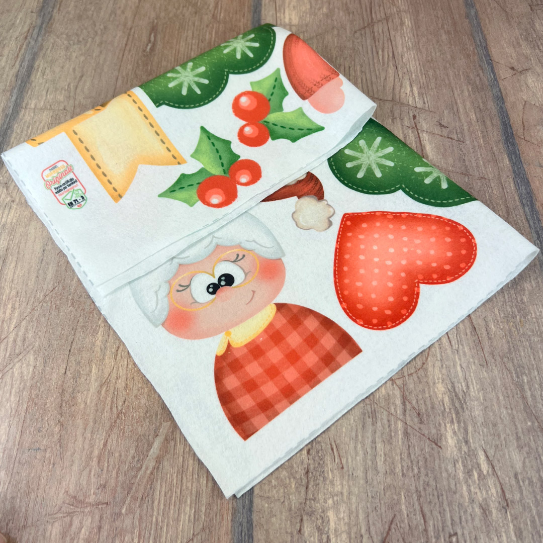 Tovagliolo natalizio con decorazioni festive colorate