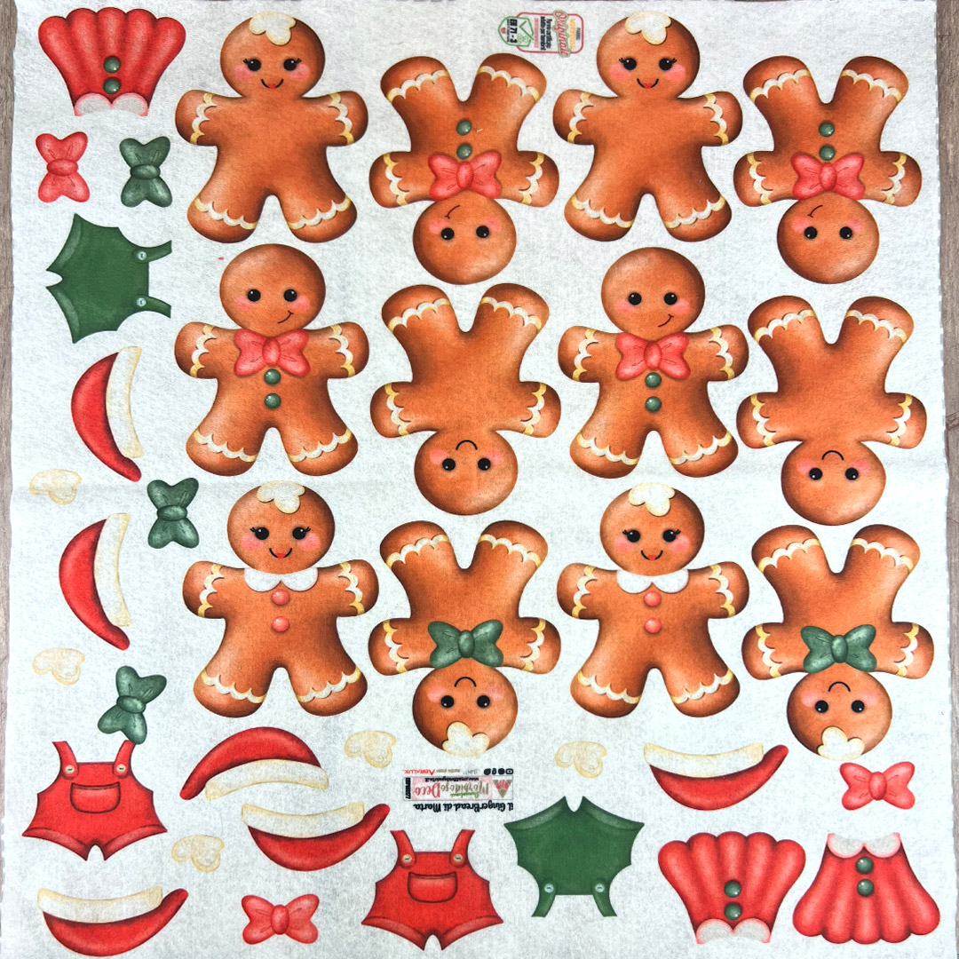 Biscotti pan di zenzero natalizi con decorazioni colorate