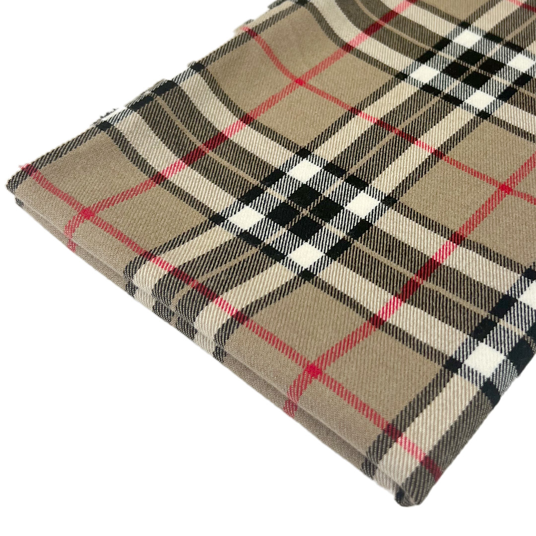 Tessuto scozzese beige a quadri rossi e neri