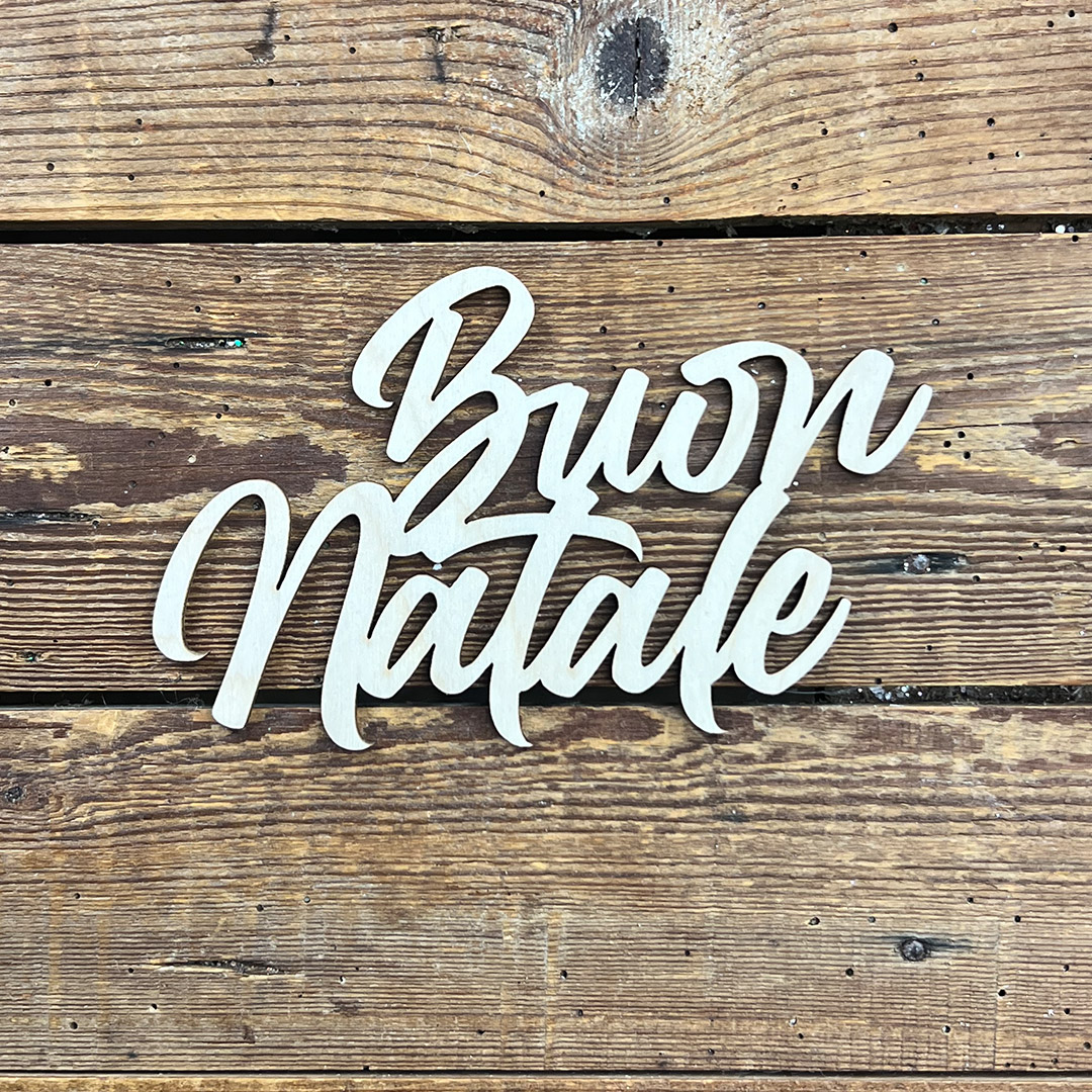 Decorazione Buon Natale in legno su tavola rustica