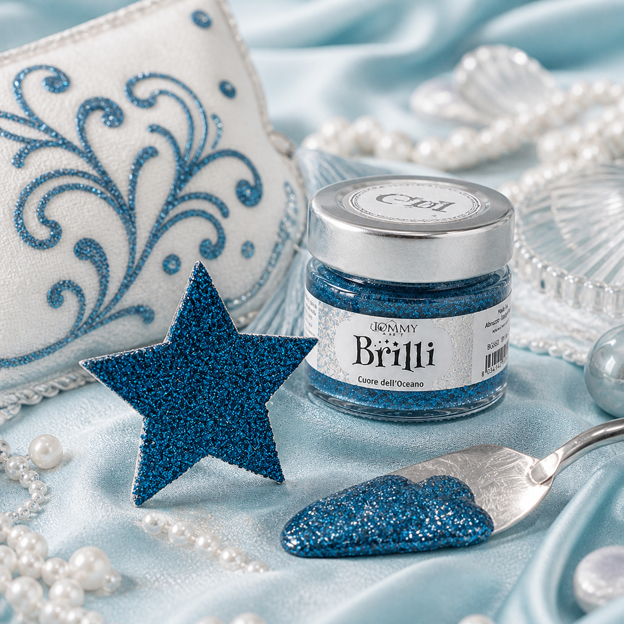 Barattolo di glitter blu con stella brillante