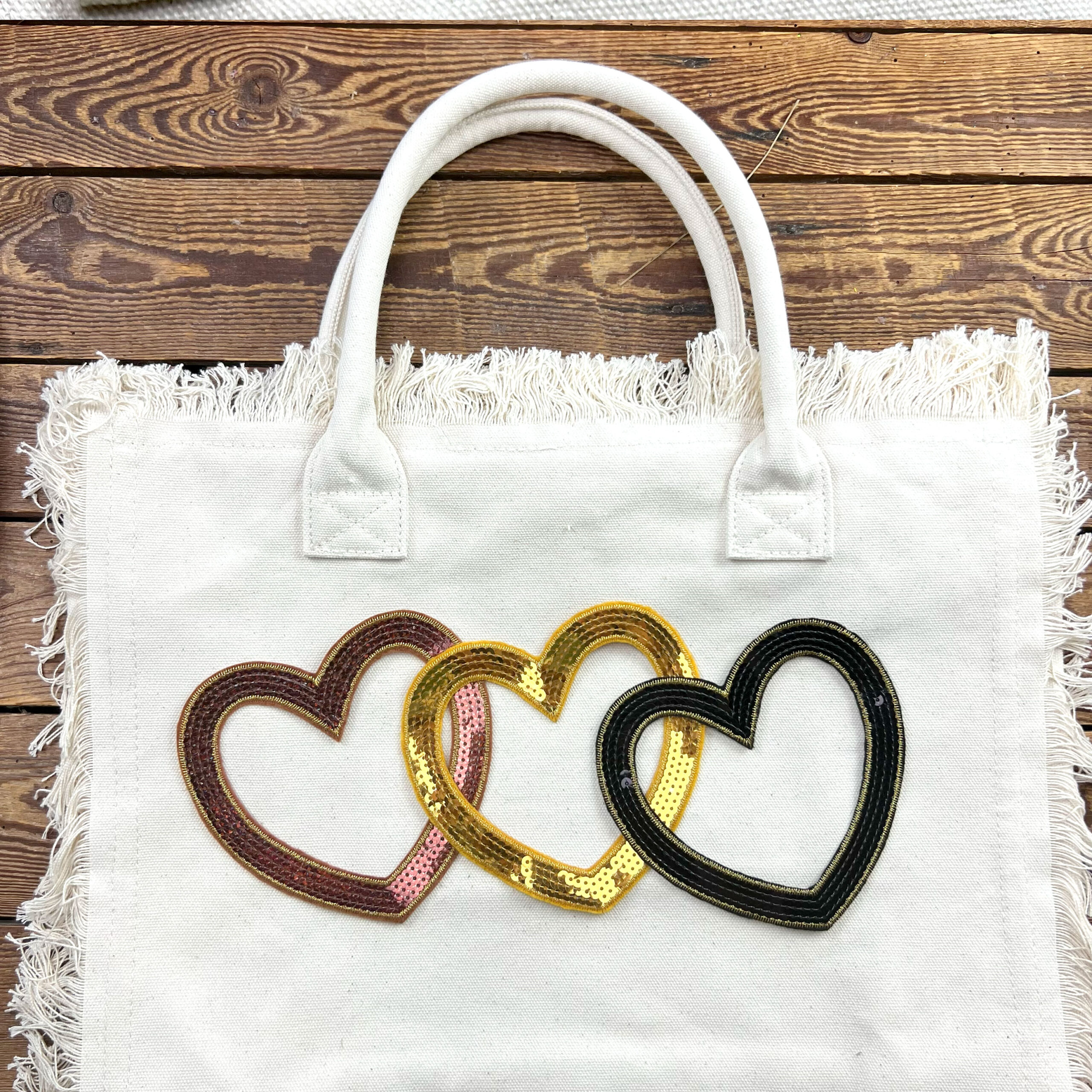 Borsa tote in tela con cuori decorativi