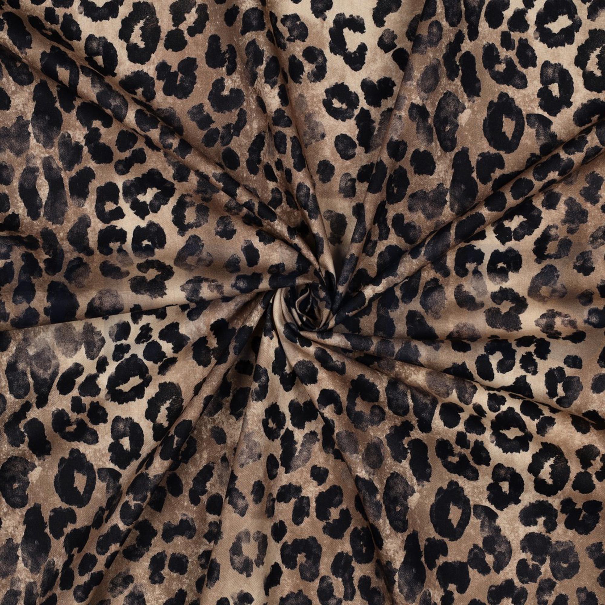 Tessuto con stampa leopardata marrone e nera